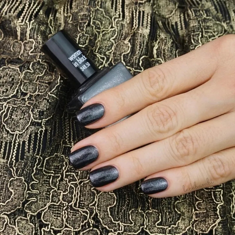 348.50 Woman In Black